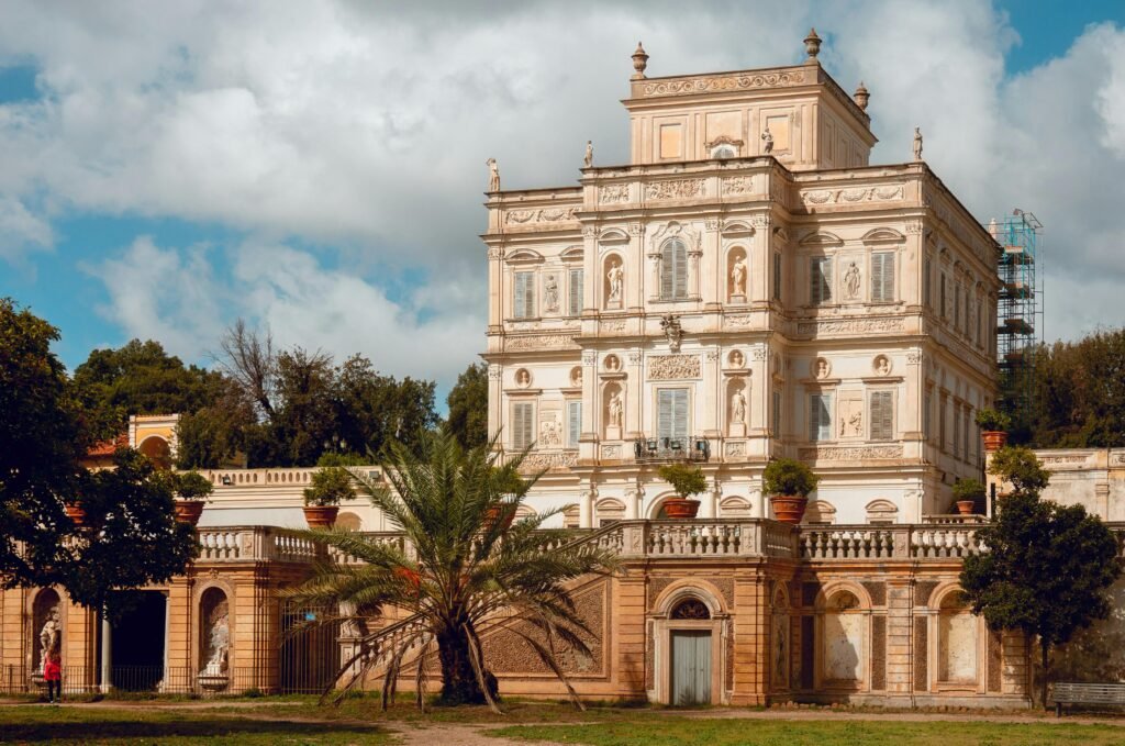 Beautiful facade of Villa Doria Pamphili with lush greenery in Rome, Italy.